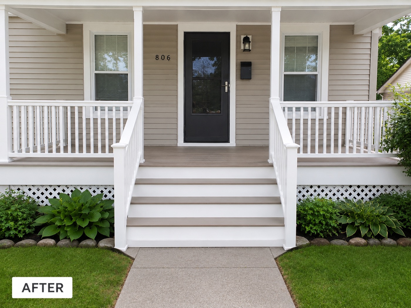 The same front porch after renovation — rebuilt white railings and fresh steps